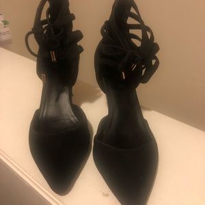 Black heels that tie around the ankles